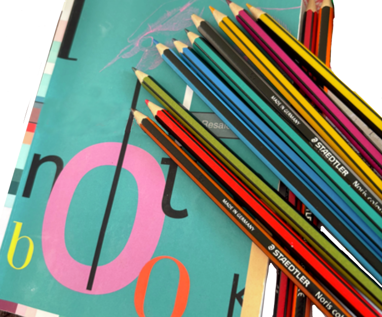 A brightly coloured notebook, with lots of coloured pencils